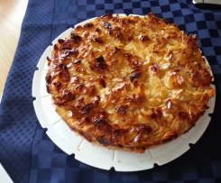 Käsekuchen mit Mandelhaube