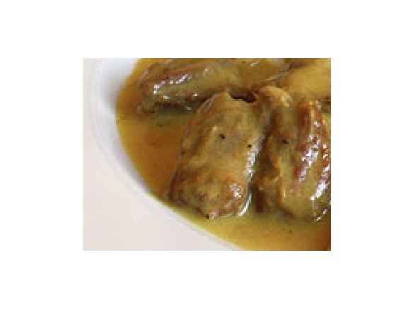 Lammgulasch an Safransauce mit Kartoffelpüree und Gemüse