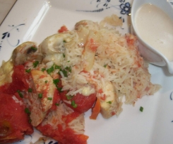 Reistopf mit Tomatensoße.