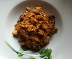 Tomatenrisotto mit Champignons und Geflügelfleisch