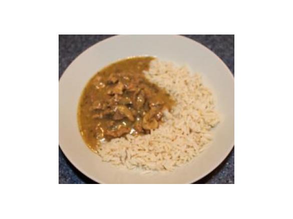 Gyros mit Reis und Champignonsoße