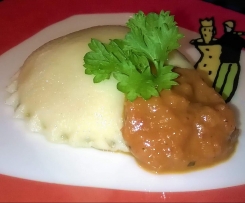 Ravioli mit Kürbis-Ricotta-Füllung zu Hähnchenfilets und Möhrchengemüse