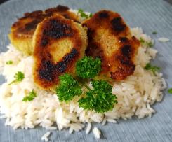 Frischkäsetaler auf Reis