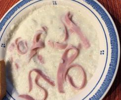 Mairübchensuppe mit Ziegenfrischkäse und Kochschinkenstreifen