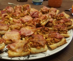 Fingerfood: Leckere Häppchen mit Tomate und Bacon