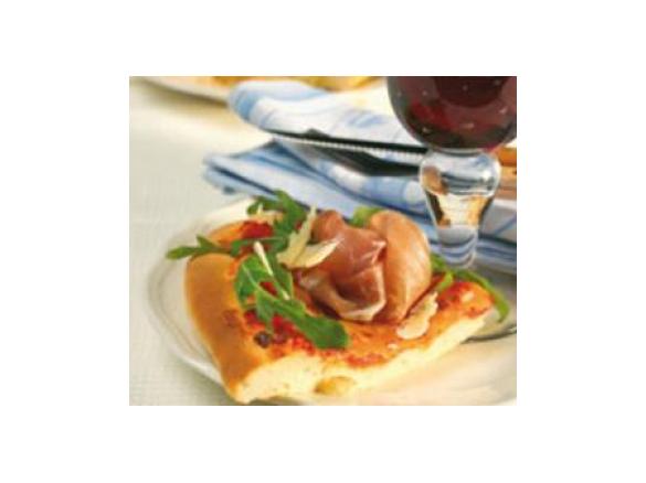 Pizza mit Rucola und Parmaschinken