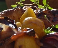 Hähnchenschenkel in Orangensauce mit roten Zwiebeln