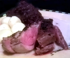 Entenbrust mit Orangen-Rosmarin-Sauce und Mini-Klöße