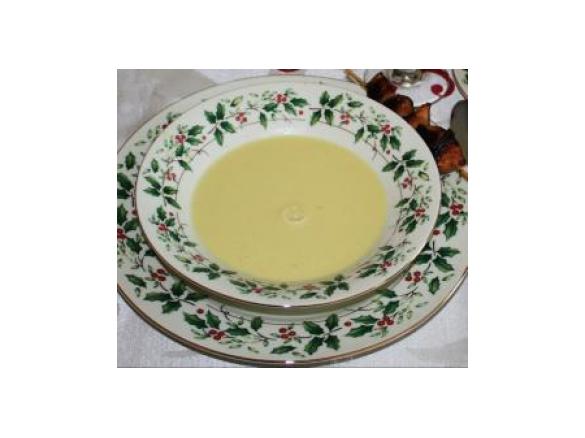 Variation von Variation von Kokos Mango Suppe mit Geflügelspieß