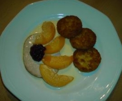 Kasseler mit Pfirsich in Käsesoße