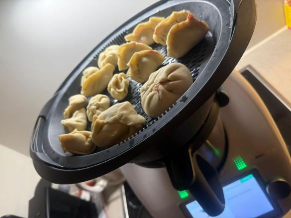 pikante gedämpfte Teigtaschen