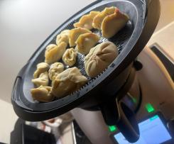 pikante gedämpfte Teigtaschen