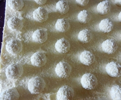 Kokospralinen-Blechkuchen