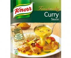 Currybällchen mit Reis und Joghurtsoße